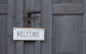 photo of a welcome sign on a door